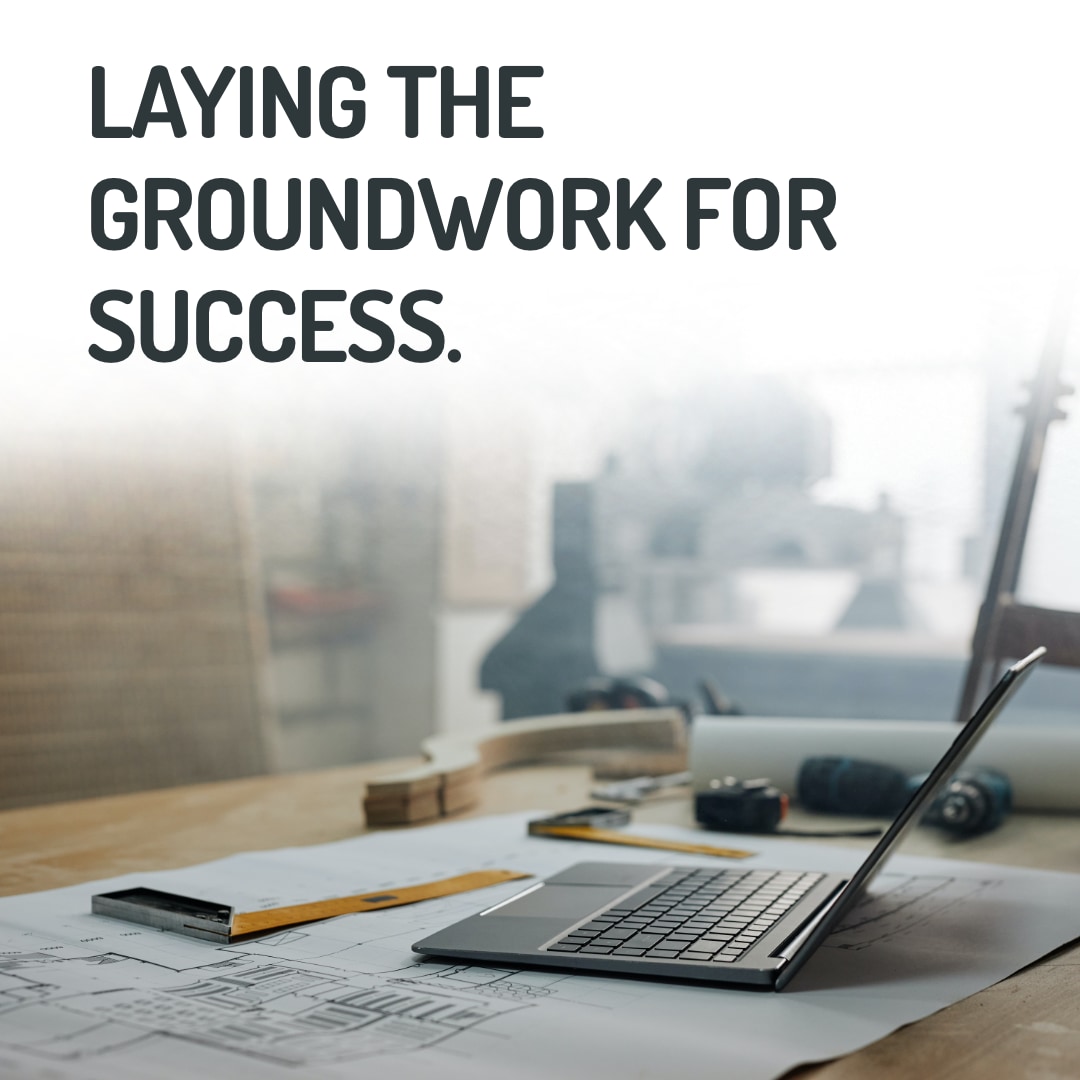 Laptop and desk equipment for planning a construction project
